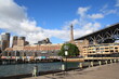View on the park hyatt hotel and others hotels, under the Harbour bridge  in center Sydney, New South Wales, Australia.