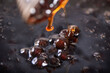 © RomixImage - Cooking, boiling brown sugar flavor tapioca pearl balls, ingredient of bubble tea, preparing food and drink, close up, recipe cookbook steps design concept.