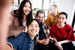 © Monster Ztudio - Selfie of group young man and woman team smiling having fun together