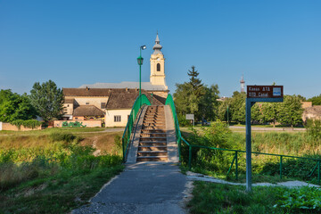 bac, serbia - july 22, 2020: pedestrian bridge for crossing the danube-tisa-danube canal in the town