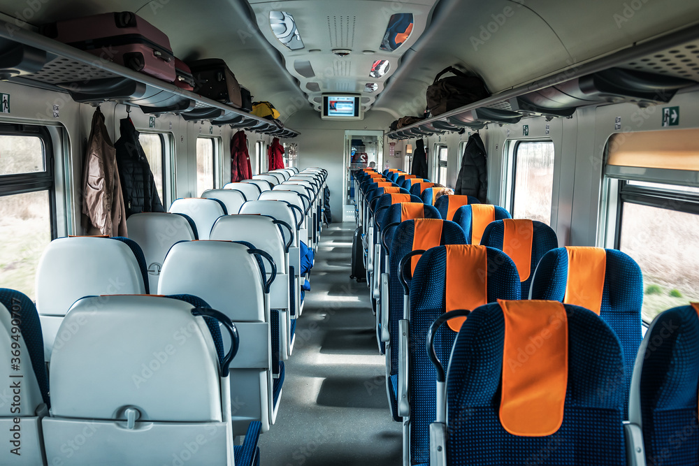 interior of a fast passenger train - obrazy, fototapety, plakaty 