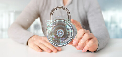 Sticker - Businessman holding a padlock and security data - 3d rendering