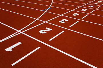 Red stadium running track closeup