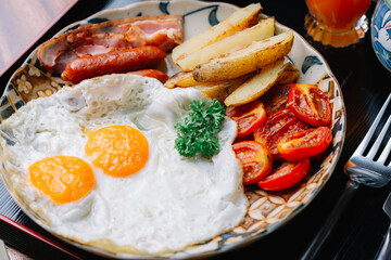 Food series: American breakfast set on wooden table in ryokan, traditional Japanese hotel