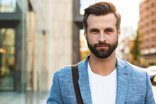 Attractive Young Bearded Man Walking Outdoors