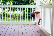 Young Ballerina Playing On Front Porch At Home Bored During Pandemic 