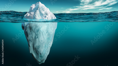 Fotomural Iceberg with its visible and underwater or submerged parts floating in the ocean