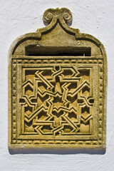 Wall Mural - Vertical closeup of a traditional Tunisian stone mailbox in Sidi Bou Said