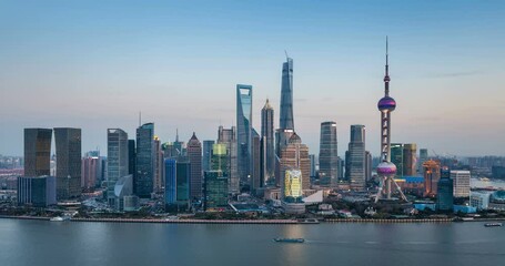 Fototapete - shanghai skyline in nightfall, time lapse of beautiful pudong financial center and huangpu river at dusk to night, China.