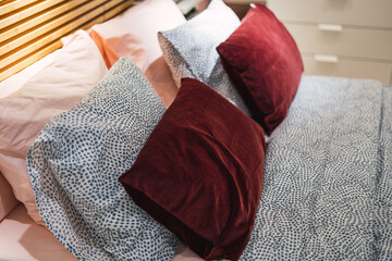 Wall Mural - Closeup shot of pillows on the bed