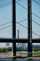 Wall Mural - Vertical shot of a part of the Rheinkniebruecke in Duesseldorf on a bright sunny day