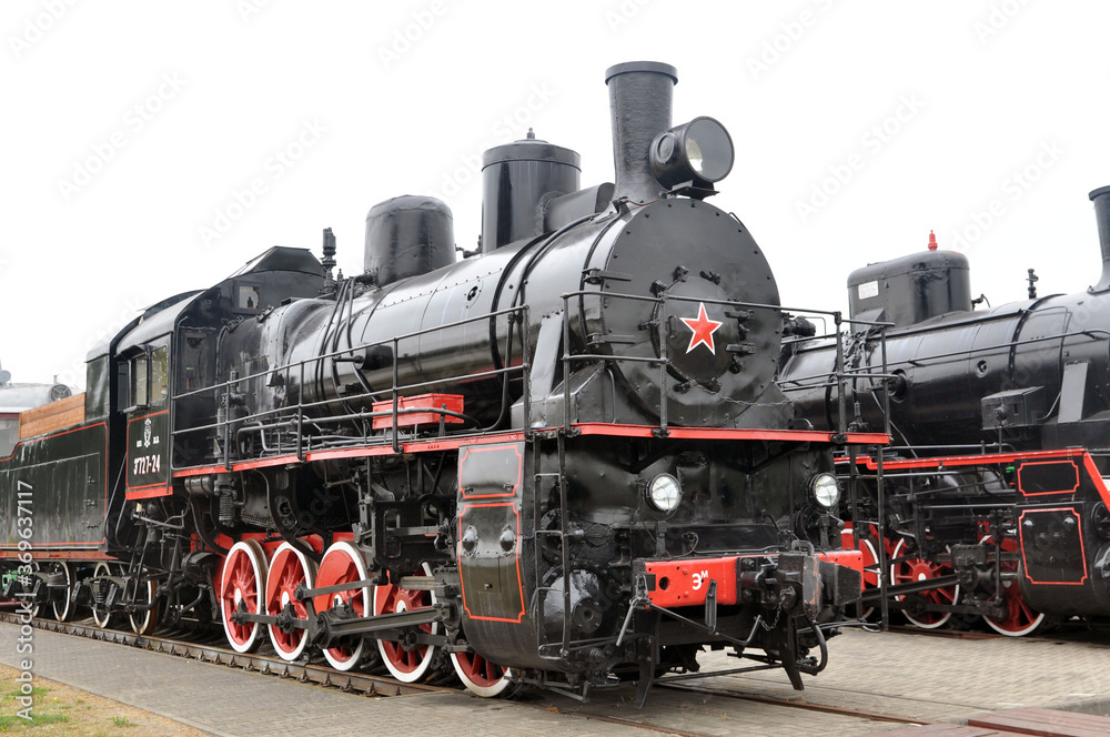 Soviet steam locomotive of the first half of the 19th century series Em in the Museum of Railway Engineering - obrazy, fototapety, plakaty 
