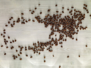  coffee beans on burlap background