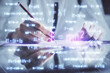 © peshkova - Science formula hologram over woman's hands taking notes background. Concept of study. Multi exposure