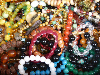 Sticker - Closeup shot of many handmade bracelets of colorful beads