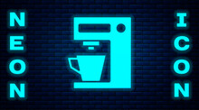 Glowing Neon Coffee Machine Icon Isolated On Brick Wall Background. Vector Illustration.