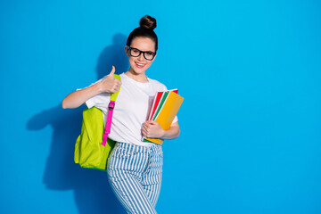 Sticker - Portrait of her she nice attractive pretty cheerful cheery girl diligent nerd carrying exercise book showing thumbup excellent a-mark isolated bright vivid sine vibrant blue color background