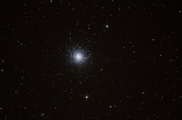 Wall Mural - Telescope view of a globular star cluster containing a multitude of stars