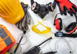 © Rawf8 - Work safety protection equipment background. Industrial protective gear on white