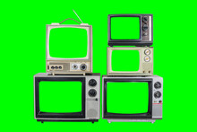 Five Vintage Televisions On Old Wood Table With Green Screens And Backgrounds.