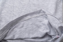 Grey Cotton Fabric Close Up. Hem Tee Shirts, Dress Hem. Fabric Stitching. Inner Side