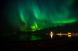 © Austin - The Aurora Borealis over Nallikari Beach in Oulu, Finland.  This spectacular display of solar winds impacting the upper atmosphere creates moving art displays in the sky.