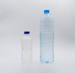 TWO EMPTY PLASTIC BOTTLES