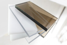 Solid Polycarbonate Sheet. Brown, White, Transparent. Acrylic Plastic Glass