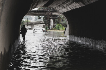 Odessa, Ukraine - September 20, 2016: Tonel. Driving cars on a flooded road during flooding caused by torrential rains. Cars float on water flooded streets. The disaster in Odessa, September 20, 2016.