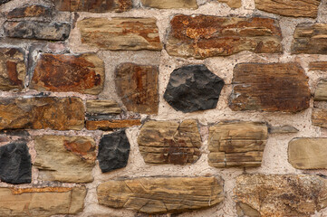 Wall Mural - Close-up stone wall. Linz on the Rhine, Germany.
A medieval stone wall.  Abstract background with stone texture. 
