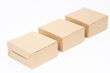 Wall Mural - Brown paper box for food package. carton on a white background.