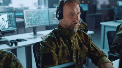 Poster - Military Surveillance Team of Officers in Headsets Working in a Central Office Hub for Cyber Operations, Control and Monitoring for Managing National Security, Technology and Army Communications.