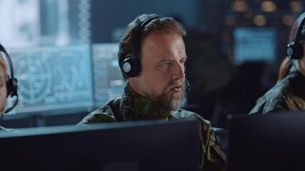 Aufkleber - Military Surveillance Team of Officers with Headsets Working in a Central Office Hub for Cyber Operations, Control and Monitoring for Managing National Security, Technology and Army Communications.