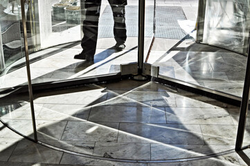 Revolving door with feet walking