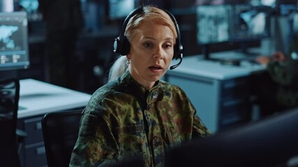 Poster - Female Military Surveillance Officer in Headset Talking to Colleague in Central Office for Cyber Operations, Control and Monitoring for Managing National Security, Technology and Army Communications.