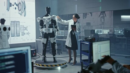 Aufkleber - In Robotics Development Laboratory: Female Scientist Uses Digital Tablet Computer, Work on a Robotics Exoskeleton Prototype. Engineers Designing Exosuit to Help Disabled People, Workers Lift Goods 