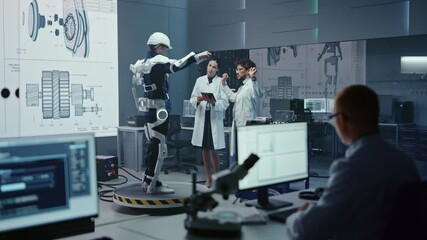 Aufkleber - In Robotics Development Laboratory: Engineers and Scientists Work on a Bionics Exoskeleton Prototype with Person Testing it. Designing Wearable Exosuit to Help Disabled People, Warehouse Workers
