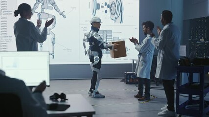 Poster - In Development Laboratory: Engineers and Scientists Look at Robotics Exoskeleton Presentation with Person Lifting Heavy Carboard Box, People Applaud and Celebrate After Successful Testing