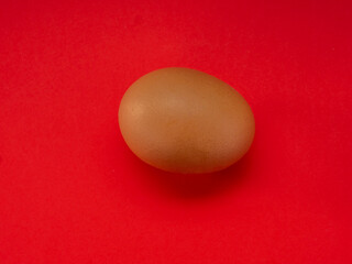 Wall Mural - Eggs on a red background