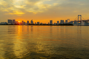 Wall Mural - Sunset with city skyline and the Rainbow Bridge, Tokyo