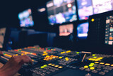 Fototapeta Miasta - Controlled in a broadcast studio. Video mixer use