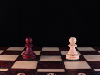 Two hand-decorated, wooden, chess figurines