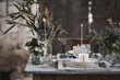 © Alberto Bogo/Stocksy - Table decorated for wedding