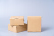 © littlestocker - Brown paper box for food package. carton on a gray background.