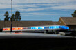 © Carolyn Lagattuta/Stocksy - The roof of a Police car with it's light on