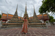 Asian women tourist traveling at Wat Po, Bangkok, Thailand, Traveler and Journey trip concept