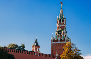 Kremlin wall and Spasskaya tower in autumn afternoon