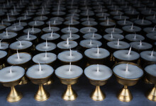 Just Prepared Butter Lamps In Bronze Candlesticks, For Fire Donations, Waiting When The Pilgrims Rush In To Buy Them And Offer The Sacrificial Fire.
