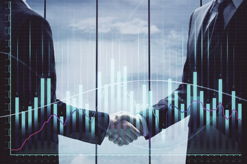 Double exposure of forex graph hologram and handshake of two men. Stock market concept.