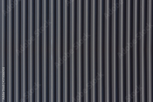 Cuadros en Lienzo A corrugated fence of grey metal sheets